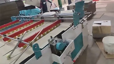 ماكينة نصف آلية لطي ولصق الكرتون المضلع (نظام التثبيت بالضغط)